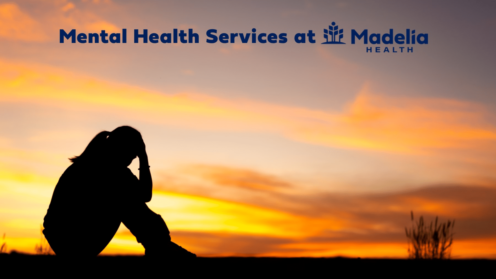 Person sitting in front of a sunset with their head in their hands. Text reads, "Mental Health Services at Madelia Health".